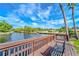Enjoy the view from this waterfront deck with a bench at 9205 Tudor Dr # C209, Tampa, FL 33615
