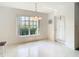 Dining area with large window and backyard access at 11111 Dormie Dr, San Antonio, FL 33576