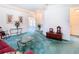 View of living room with entryway and wooden chest at 11111 Dormie Dr, San Antonio, FL 33576