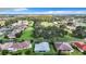 Aerial view of houses and golf course at 11111 Dormie Dr, San Antonio, FL 33576