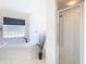 Relaxing bathroom with corner tub, glass shower, and a window at 11111 Dormie Dr, San Antonio, FL 33576