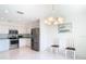 Kitchen with stainless steel appliances and white cabinets at 11111 Dormie Dr, San Antonio, FL 33576
