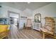 Welcoming entryway with wicker chairs and a stylish console table at 963 Highland Ave, Dunedin, FL 34698