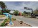 Quaint downtown street with shops and a dolphin statue at 963 Highland Ave, Dunedin, FL 34698