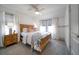 Charming bedroom with a wooden bed frame and plenty of natural light at 963 Highland Ave, Dunedin, FL 34698
