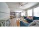Bright living room with comfy seating, fireplace, and an open floor plan at 963 Highland Ave, Dunedin, FL 34698