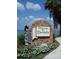 Dunedin welcome sign with bagpiper and waterfront view at 963 Highland Ave, Dunedin, FL 34698