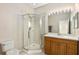 Bathroom features a shower, vanity with wood cabinets, and a toilet at 7219 Hamilton Rd # 7219, Bradenton, FL 34209