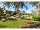 Wooden footbridge pathway in a lush, green community at 7219 Hamilton Rd # 7219, Bradenton, FL 34209