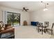 Living area with sliding door leading to a balcony at 7219 Hamilton Rd # 7219, Bradenton, FL 34209