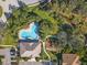Aerial view of community pool, playground, and landscaping at 7219 Hamilton Rd # 7219, Bradenton, FL 34209