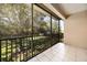 Spacious screened balcony overlooking a lush green backyard at 7219 Hamilton Rd # 7219, Bradenton, FL 34209