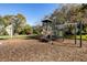 Community playground with playset and woodchips at 7219 Hamilton Rd # 7219, Bradenton, FL 34209