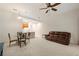 Spacious living room with a leather couch and dining area at 7219 Hamilton Rd # 7219, Bradenton, FL 34209