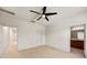 Large bedroom with ceiling fan and neutral carpeting at 7219 Hamilton Rd # 7219, Bradenton, FL 34209