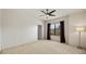 Bedroom with window, ceiling fan, and neutral decor at 7219 Hamilton Rd # 7219, Bradenton, FL 34209