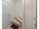 Interior view of carpeted stairwell and entry door at 7219 Hamilton Rd # 7219, Bradenton, FL 34209