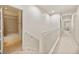 Upstairs hallway with bathroom and bedroom access at 7219 Hamilton Rd # 7219, Bradenton, FL 34209