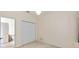 Bright bedroom with carpet, closet, and access to bathroom at 7219 Hamilton Rd # 7219, Bradenton, FL 34209