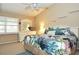 Spacious main bedroom with high ceilings and a ceiling fan at 3230 Jademoor Cir, Palm Harbor, FL 34685
