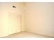 Bedroom with double door closet and wall-to-wall carpet at 3230 Jademoor Cir, Palm Harbor, FL 34685