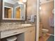 Updated bathroom with a vanity, toilet, and shower at 3230 Jademoor Cir, Palm Harbor, FL 34685