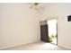 Bright bedroom with sliding glass door leading to patio at 3230 Jademoor Cir, Palm Harbor, FL 34685