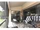 Relaxing screened patio perfect for outdoor dining at 3230 Jademoor Cir, Palm Harbor, FL 34685