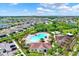Community overview featuring a pool, playground, and many houses at 13573 Willow Bluestar Loop, Riverview, FL 33579