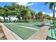 Well maintained shuffleboard courts with benches at 3365 39Th S St # C-1, St Petersburg, FL 33711