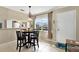 Small dining area with table and chairs, near the kitchen and entry at 3365 39Th S St # C-1, St Petersburg, FL 33711