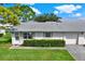 Cozy single-story home with a two-car garage and well-manicured lawn at 3365 39Th S St # C-1, St Petersburg, FL 33711