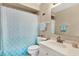 Clean bathroom with shower/tub combo and updated vanity at 3365 39Th S St # C-1, St Petersburg, FL 33711