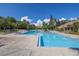 Community pool and spa with volleyball court at 11901 4Th N St # 12107, St Petersburg, FL 33716