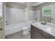 Nice bathroom with a shower/tub combo and dark vanity at 11901 4Th N St # 12107, St Petersburg, FL 33716