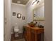 Elegant powder room with vessel sink and wooden vanity at 1408 W Azeele St, Tampa, FL 33606