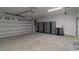 Finished garage with storage cabinets and epoxy flooring at 1408 W Azeele St, Tampa, FL 33606