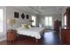 Spacious bedroom with hardwood floors, large windows, and ample closet space at 1408 W Azeele St, Tampa, FL 33606