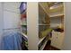 Large bedroom closet with ample storage shelving at 1408 W Azeele St, Tampa, FL 33606