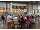 Indoor restaurant with a full bar and patrons seated at tables at 1408 W Azeele St, Tampa, FL 33606