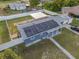 Backyard with grassy area, partially fenced, and some landscaping at 1009 Cobblestone Dr, Spring Hill, FL 34606
