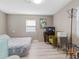 Bright bedroom with a queen-size bed and light flooring at 1009 Cobblestone Dr, Spring Hill, FL 34606