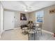 Bright dining room with four chairs and a glass table at 1009 Cobblestone Dr, Spring Hill, FL 34606