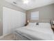 Bedroom with king-size bed and large closet at 1009 Cobblestone Dr, Spring Hill, FL 34606