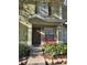 Inviting front entrance with red chairs at 8504 Brushleaf Way, Tampa, FL 33647