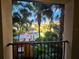 Community pool surrounded by lush landscaping and palm trees at 100 4Th S Ave # 205, St Petersburg, FL 33701