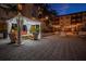 Covered outdoor seating area with comfortable chairs and string lights at 100 4Th S Ave # 205, St Petersburg, FL 33701
