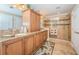 Modern bathroom with double sinks and walk-in shower at 10045 Gulf Blvd, Treasure Island, FL 33706