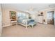 Spacious Primary bedroom with a king-size bed and ensuite bathroom at 10045 Gulf Blvd, Treasure Island, FL 33706