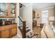 Wooden staircase leading to an upper level with a wet bar at 10045 Gulf Blvd, Treasure Island, FL 33706